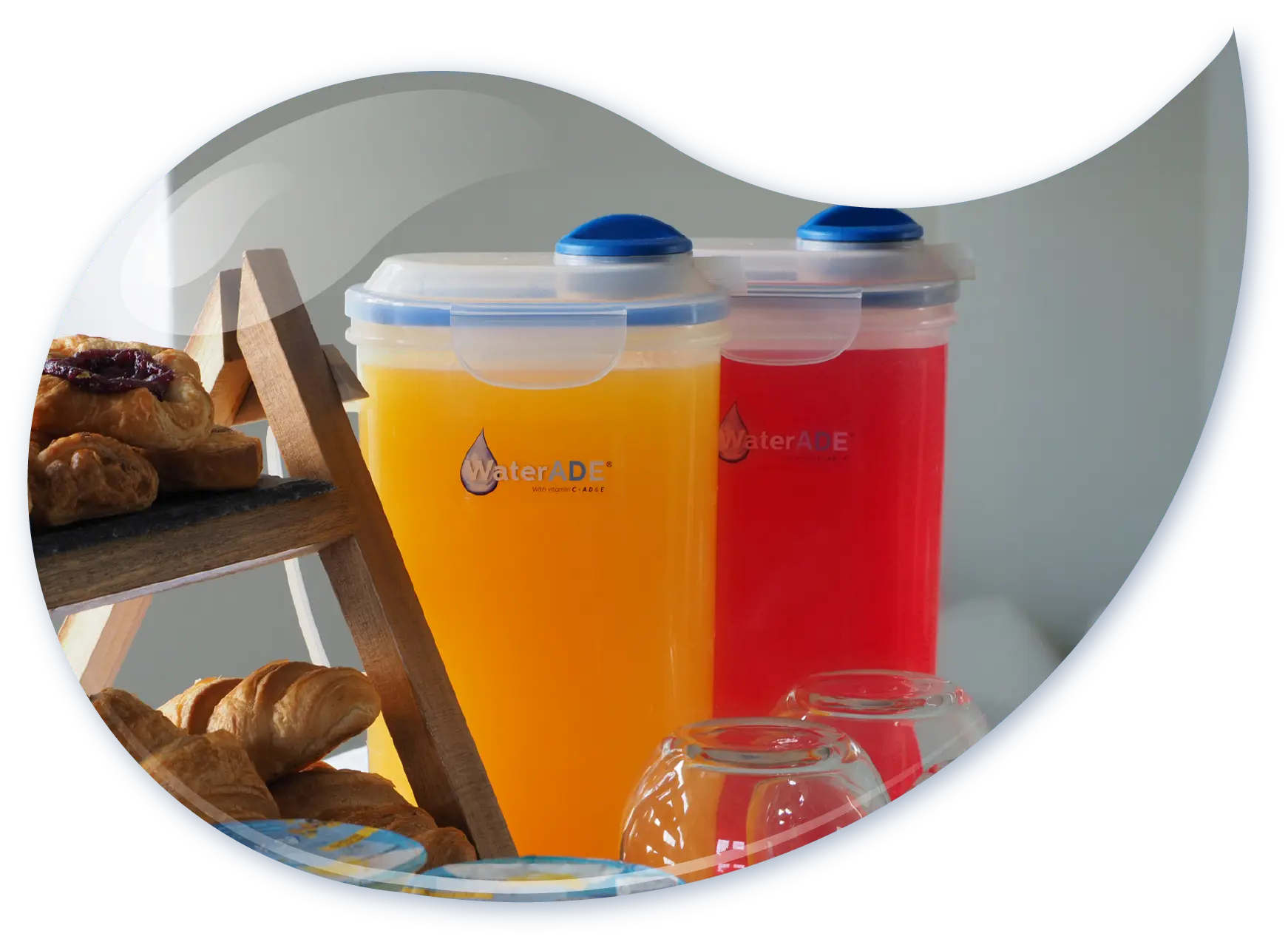 two containers of WaterADE drinks on a breakfast table